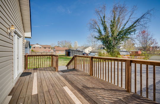 professional office space, deck access, wood deck, french door, vinyl siding
