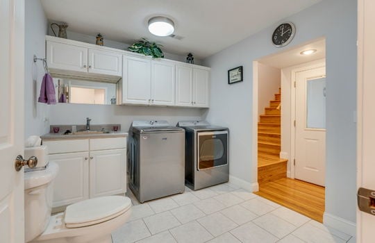 half bath, toilet, sink, washer & dryer hookups