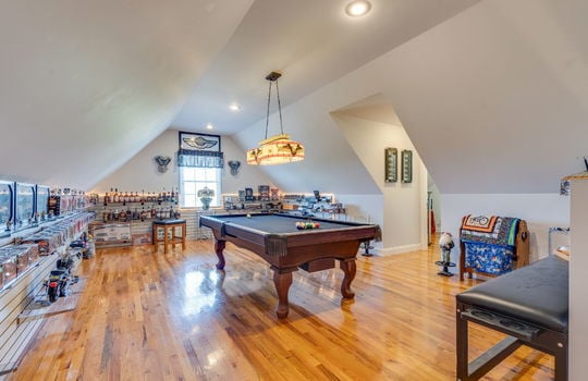 upper level living space, hardwood flooring, recessed lighting