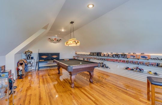 upper level living space/bedroom/game room, recessed lighting, hardwood flooring