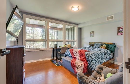 bedroom, large windows, hardwood flooring