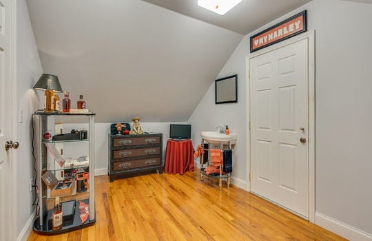 hallway/living space, sink, doorway