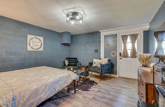 bedroom, block wall, exterior door