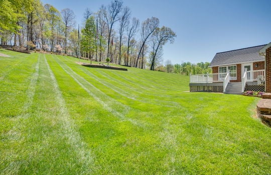 back yard, landscaping, back deck, brick home exterior