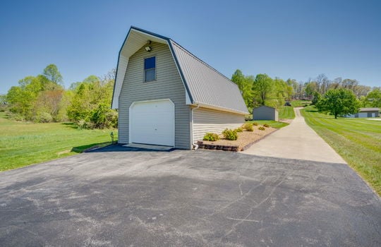 detached garage/outbuilding, landscaping, private drive, yard