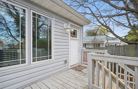 deck, front door, vinyl siding