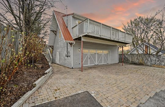 bungalow, for lease, driveway, two car garage, metal roof, vinyl siding, back deck, fencing