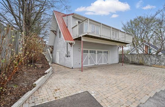bungalow, for lease, driveway, two car garage, metal roof, vinyl siding, back deck, fencing