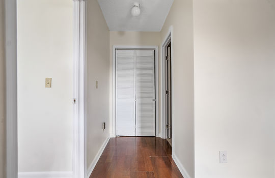 hallway, linen closet, laminate flooring
