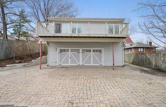 bungalow, for lease, driveway, two car garage, metal roof, vinyl siding, back deck, fencing