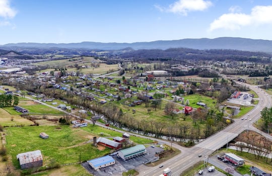 building, residential space for lease, nearby properties, road, mountain views