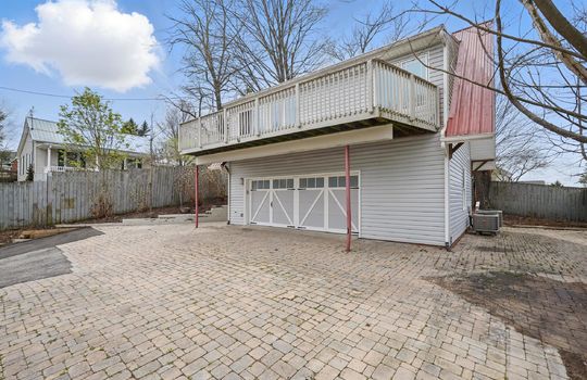bungalow, for lease, driveway, two car garage, metal roof, vinyl siding, back deck, fencing