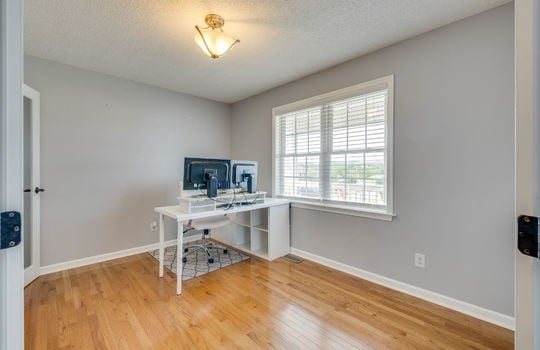 bedroom/office, hardwood flooring, window