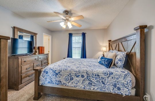 bedroom, carpet, window, ceiling fan, door to ensuite