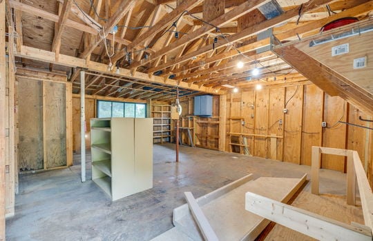 outdoor workshop, concrete flooring, lighting, windows