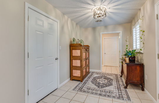 breakfast nook, tile flooring, door