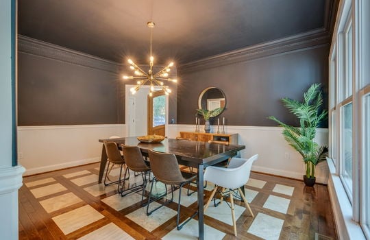 dining room, tile and hardwood flooring, windows, chandelier