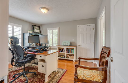 second bedroom, hardwood flooring, closet, windows
