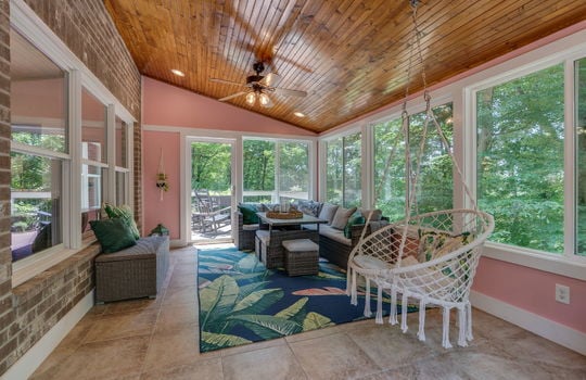 sunroom, windows, door to deck, ceiling fan
