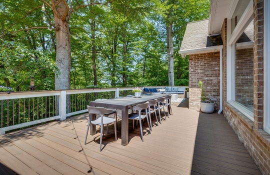 deck, deck railing, brick exterior, exterior entry doors