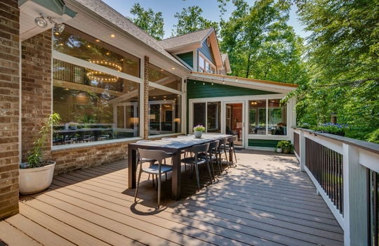 deck, deck railing, brick exterior, exterior entry doors