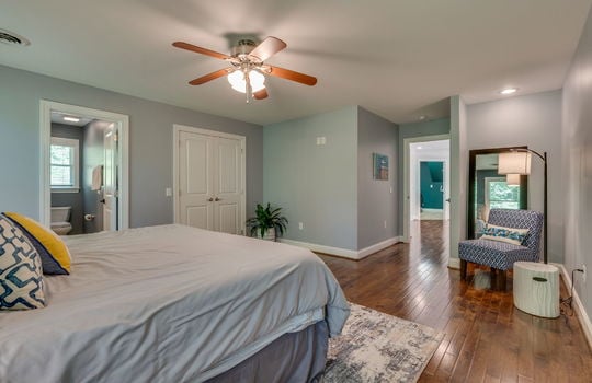 bedroom, hardwood flooring, ceiling fan, closet, ensuite bathroom