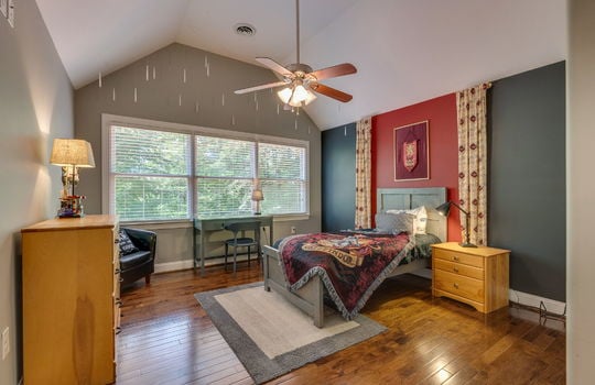 bedroom, hardwood flooring, vaulted ceiling, ceiling fan, windows