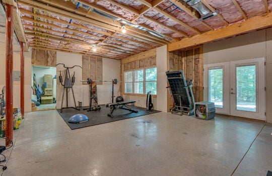basement, concrete flooring, exterior doors, windows, unfinished