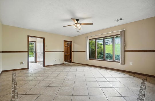 entry/foyer, den, tile flooring, office door, window