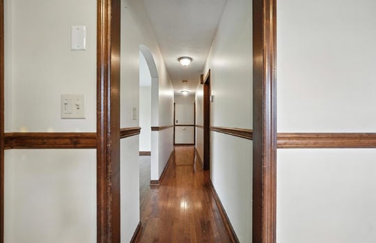 hallway, hardwood flooring, wood trim