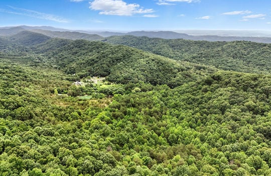 aerial view of surrounding mountains, trees