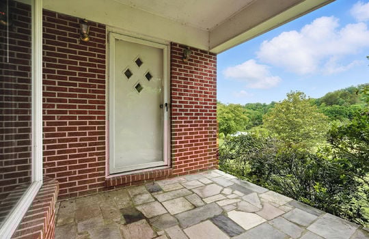 front porch, front door, storm door, brick ranch, mountain views