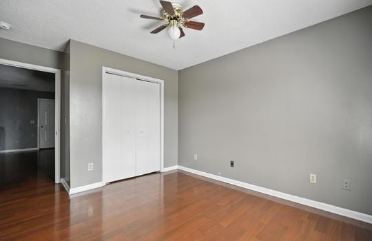 bedroom, closet, ceiling fan, laminate flooring