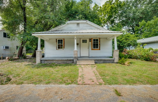 house, bungalow, cottage, metal roof, front yard, sidewalk, front porch, front door, fixer upper