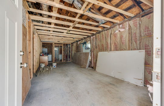 house interior, wood framing, demoed room, living room, fixer upper