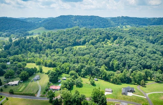 aerial photo of property, neighboring homes, mountain views