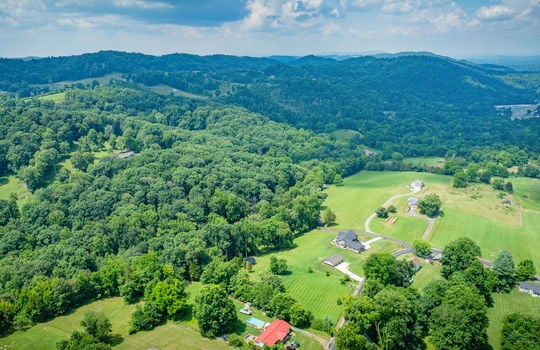 aerial photo of property, neighboring homes, mountain views