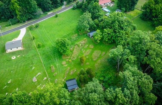 aerial photo, road, trees, cabin, shed, neighboring homes
