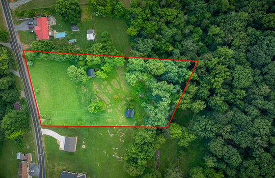 aerial photo, aerial photo of property with property boundary lines, cleared land, trees, shed, cabin