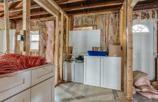 room, wood framing for walls/ceiling, windows, subflooring, exterior door