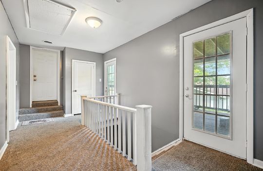 upstairs apartment, landing, door to deck, carpet