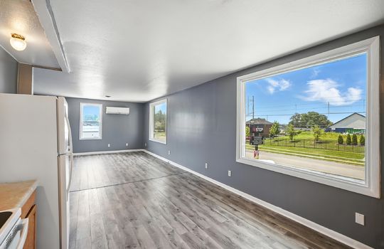 picture window, kitchen/living room, luxury vinyl flooring, windows, refrigerator, oven/range