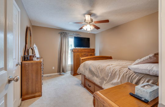 third bedroom, carpet, ceiling fan, window, closet