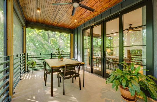 creened porch, outdoor dining area, double interior doors, ceiling fan