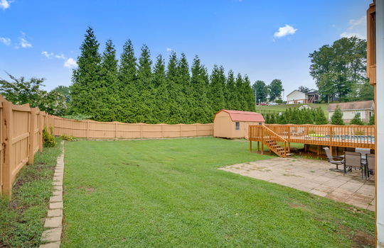 back yard, fenced, landscaping, back deck, storage shed, patio, pool