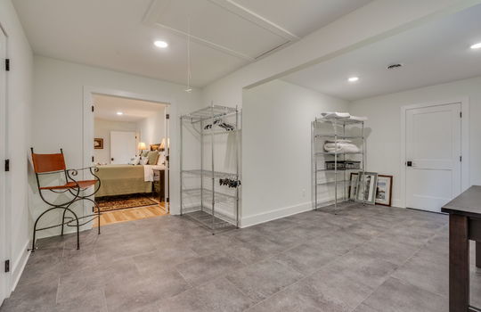 spacious utility closet, door to bedrrom