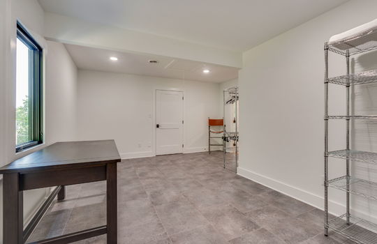 spacious utility closet, storage, tile flooring, window