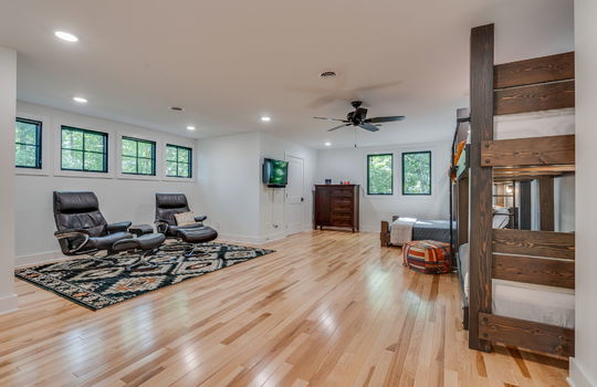 upper level bedroom, spacious, recessed lighting, windows, ceiling fans, hardwood flooring