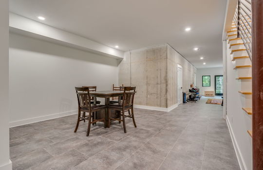 main home lower level, recreation room, storage, tile flooring