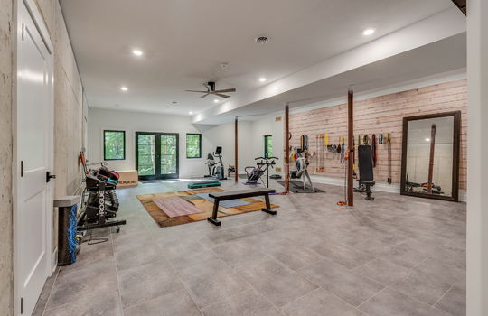 main home lower level, recreation roomn, storage, tile flooring